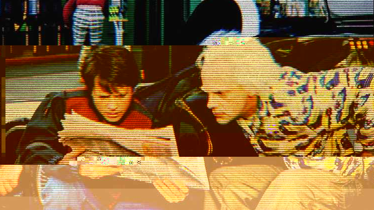 Doc and Marty reading a newspaper